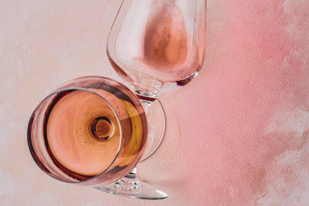 rose wine on pink background